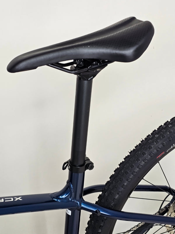 Detailed shot of the Trek X-CALIBER 7 frame paintwork showing its excellent condition.