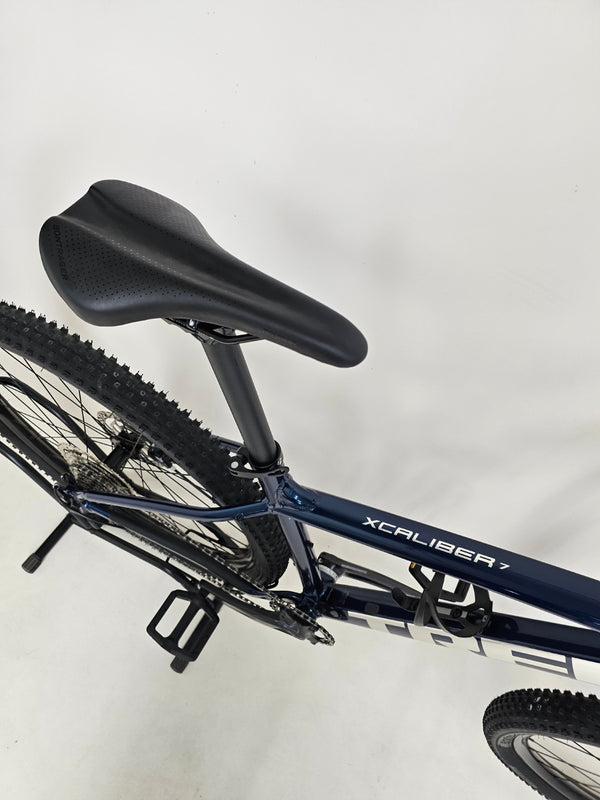 Trek X-CALIBER 7 mountain bike with details on the rear wheel and hub quality.