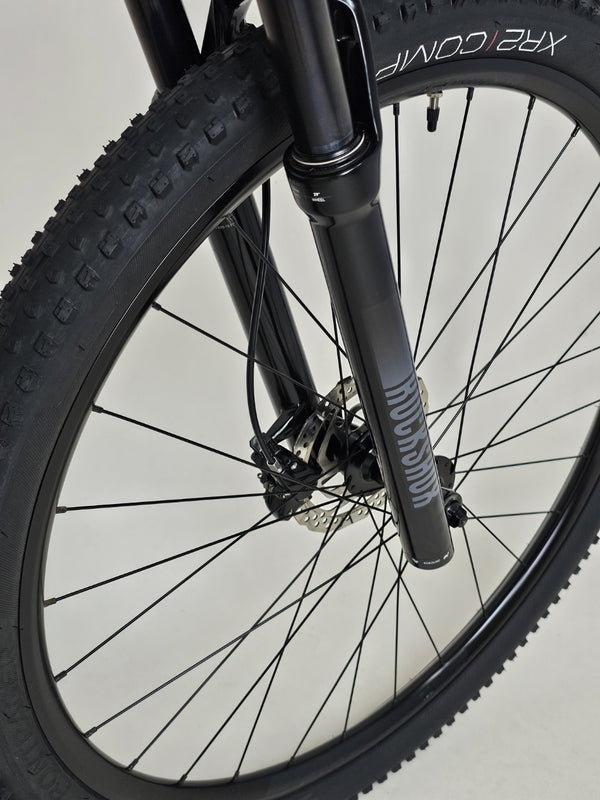 Angle view of the Trek X-CALIBER 7 displaying its well-maintained frame and components.