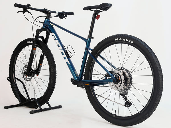 Detailed view of Shimano SLX shifters on the Giant XTC SLR 29 1 Mountain Bike 2024.