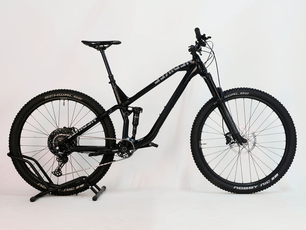 NS Bikes Define AL 130 2 2023 Full Suspension Bike - Close-up of the bike showcasing the sleek frame and suspension features from NS Bikes.