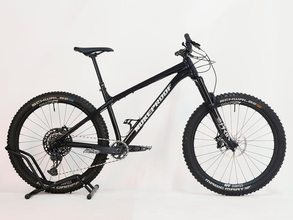 Nukeproof Scout 275 RS 2023 in excellent used condition, focusing on the high-performance rubber Schwalbe Magic Mary tires.