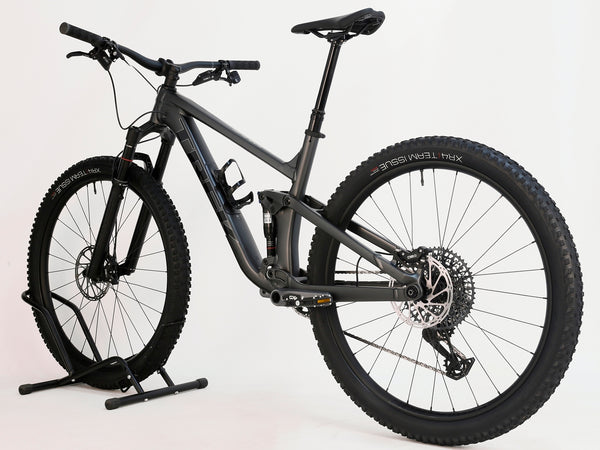 Rear view of Trek Top Fuel 8 GX AXS 2024 LARGE Frame in Excellent Condition at eMado Bikes, showcasing the Bontrager Line Comp 30 wheels.