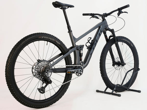 Close-up of Trek Top Fuel 8 GX AXS 2024 LARGE Frame in Excellent Condition at eMado Bikes, highlighting the precision engineering of the RockShox Pike front suspension.