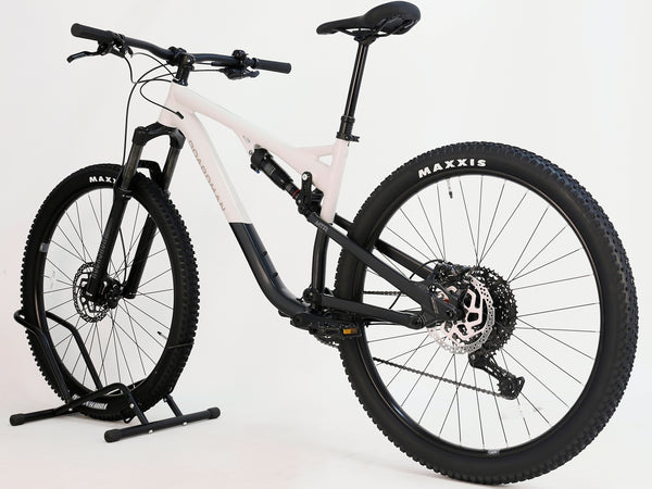 Side angle view of the 2025 Boardman MTR 8.8 UPGRADED bike highlighting its white and black design.