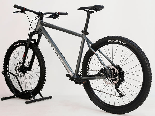 Tires of the Whyte 801 V4 2023 mountain bike, Maxxis Forekaster, showcasing its off-road capability.