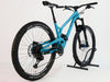 Evil Offering V1 carbon fiber full suspension bike in blue, very good condition, showcasing rear view and details.