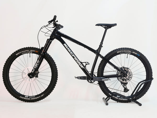 Side profile of Nukeproof Scout 275 RS 2023 in excellent used condition, displaying SRAM GX Eagle 12-speed drivetrain.