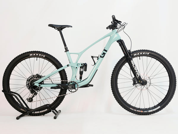 Side angle of GT Sensor Carbon Pro LE 2024 large mountain bike, featuring the seat post and rear shock details.