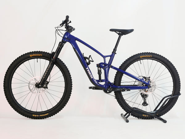 Trek Fuel EX 7 2024 Gen 6 (upgraded), M-L in Very Good Condition - rear view highlighting the Fox Performance Float EVOL shock.