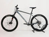 Rear view of the Whyte 801 V4 2023 mountain bike, highlighting the Shimano Deore derailleur and cassette.