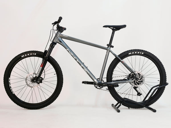 Rear view of the Whyte 801 V4 2023 mountain bike, highlighting the Shimano Deore derailleur and cassette.