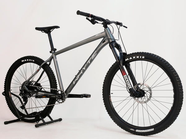 Shimano Deore shifters featured on the Whyte 801 V4 2023 mountain bike, representing smooth gear shifting.