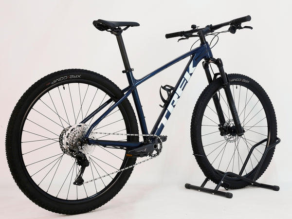 Trek X-CALIBER 7 2021 Mountain Bike rear view highlighting the Shimano MT200 hydraulic disc brakes and Shimano Deore components.