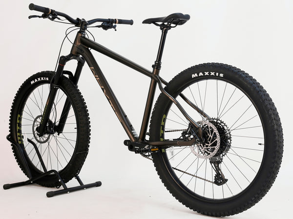 Rear view of the Whyte 901 V5 2024 Mountain Bike highlighting its wheels and tires at eMado.