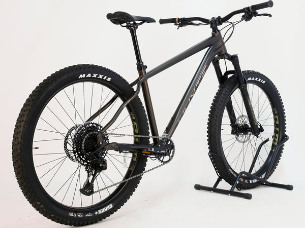 Side profile of the Whyte 901 V5 2024 Mountain Bike showcasing its satin bronze colour at eMado.