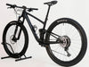 Side profile of the Giant Anthem Advanced Pro 29 2 2023 CARBON showing its lightweight frame and stylish design.