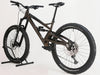 Orange ALPINE 6 Full Suspension Mountain Bike displayed on a trail, ready for adventure.