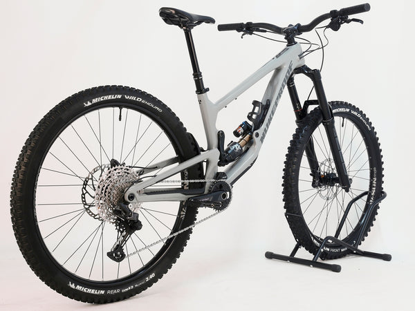 Rear view of Nukeproof Giga 290 Comp Carbon 2022 bike showing suspension and wheel detail.