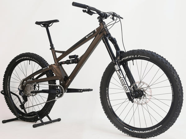 Detail shot of the Orange ALPINE 6 mountain bike's overall excellent condition, showcasing high-end components.