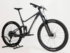 Front view of Giant Stance 29 2 2024/LARGE mountain bike emphasizing the front suspension fork and disc brake system.