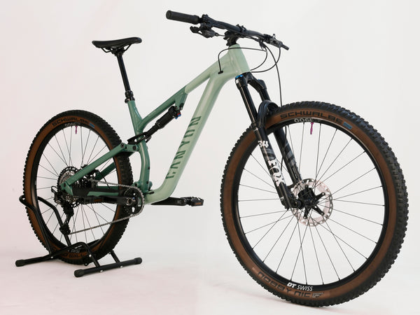 Front suspension detail on the 2023 Canyon Neuron 7 Full Suspension Bike, Large size, featuring FOX 34 Float Performance GRIP, in Very Good Condition.