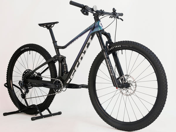 Close-up of the front suspension on the Scott Spark RC 900 Team Issue AXS Carbon bicycle.