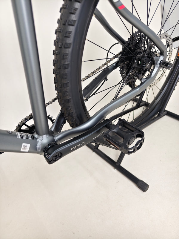 Detailed capture of the cockpit on the Whyte 801 V4 2023 mountain bike, including grips and controls.