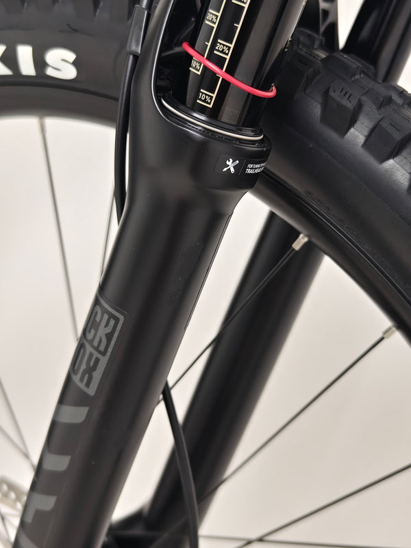 Close-up of the reflective branding on the Merida One-Sixty 500 2023 mountain bike.