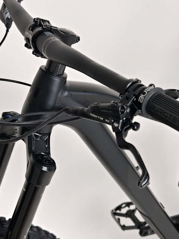 Cube Stereo 170 SL 29 mountain bike 2021 model laying flat, highlighting its features.