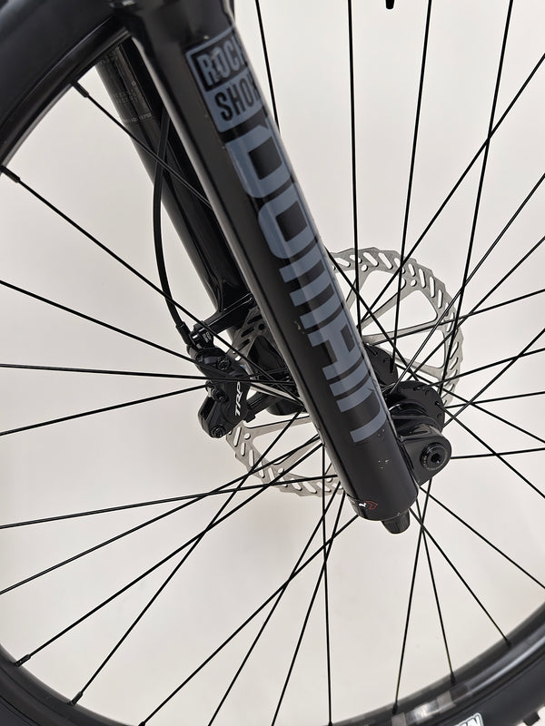 Cube Stereo 170 SL 29 mountain bike 2021 ready to ride positioned on a path.