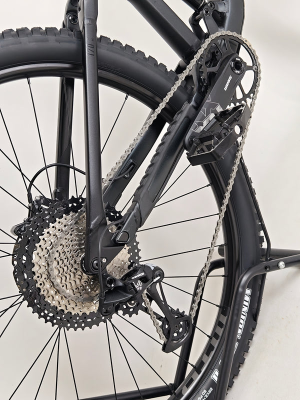 In-action shot of Cube Stereo 170 SL 29 mountain bike 2021 on a mountain trail.