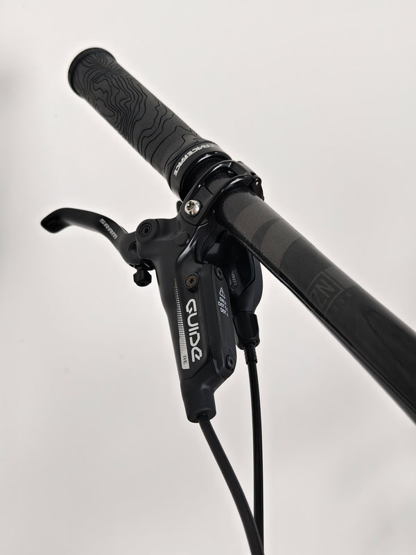 Focused image of the brake lever on the Nukeproof Reactor 290 PRO 2023 at eMado Bikes.