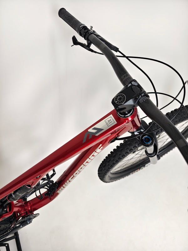 Close-up of the frame's top tube with Nukeproof Reactor 290 PRO 2023 branding at eMado Bikes.