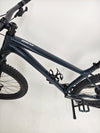Detailed view of the handlebars and shifters on Specialized Fuse Sport 27.5 2024 in Excellent Condition at eMado Bikes, showcasing SRAM components.