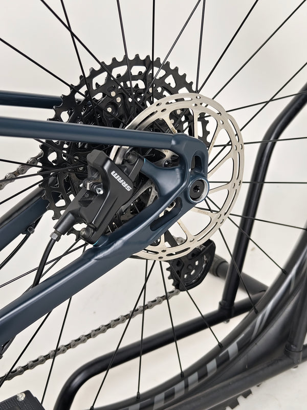 Close-up shot of the seat and post adjustment mechanism on Specialized Fuse Sport 27.5 2024 in Excellent Condition at eMado Bikes.