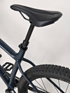 Close-up view of the bike frame and water bottle holder on Specialized Fuse Sport 27.5 2024 in Excellent Condition at eMado Bikes.