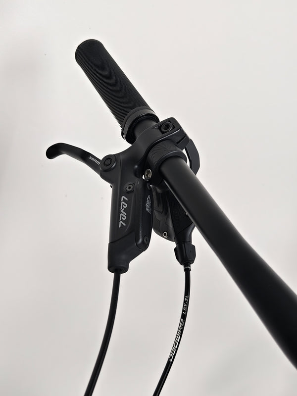 Close-up of Specialized Fuse Sport 27.5 2024 in Excellent Condition at eMado Bikes, highlighting the disc brakes and tire details.
