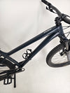 View of the bike’s rear wheel and tire on Specialized Fuse Sport 27.5 2024 in Excellent Condition at eMado Bikes.