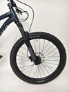 Rear view showcasing the wheel and rear derailleur on the Specialized Fuse Sport 27.5 2024 in Excellent Condition at eMado Bikes.