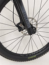 Front side detail of the Specialized Fuse Sport 27.5 2024 in Excellent Condition at eMado Bikes, with focus on the suspension fork.