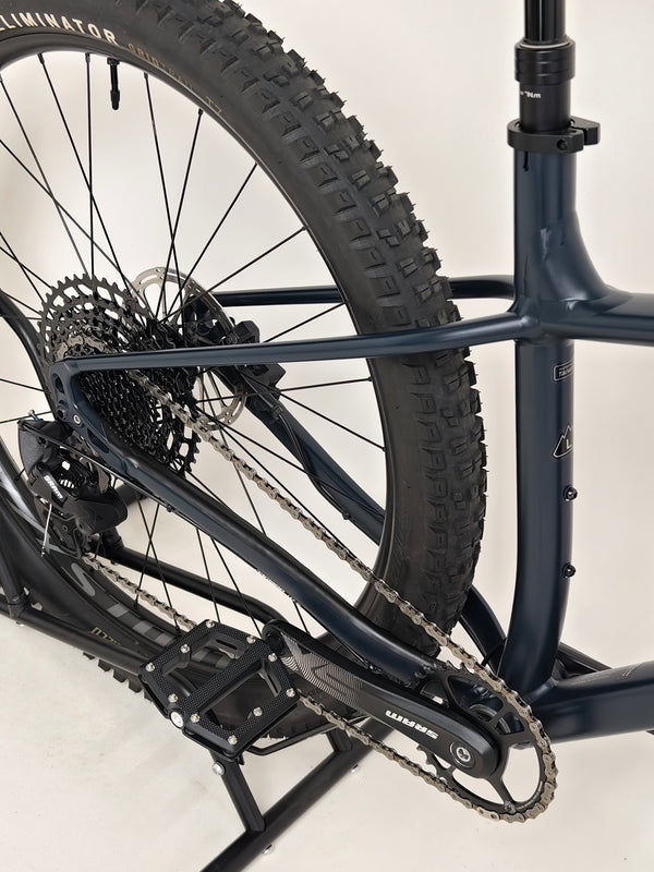 The specialized Fuse Sport 27.5 2024 in Excellent Condition at eMado Bikes, highlighting details around the rear hub area.