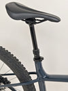 Rear wheel close-up showcasing the disc brake on the Specialized Fuse Sport 27.5 2024 in Excellent Condition at eMado Bikes.