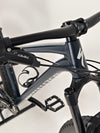 Close-up of the shock suspension and mount on Specialized Fuse Sport 27.5 2024 in Excellent Condition at eMado Bikes.
