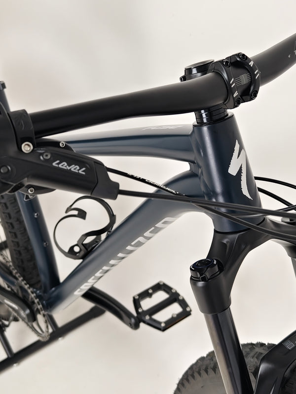 Close-up of the shock suspension and mount on Specialized Fuse Sport 27.5 2024 in Excellent Condition at eMado Bikes.