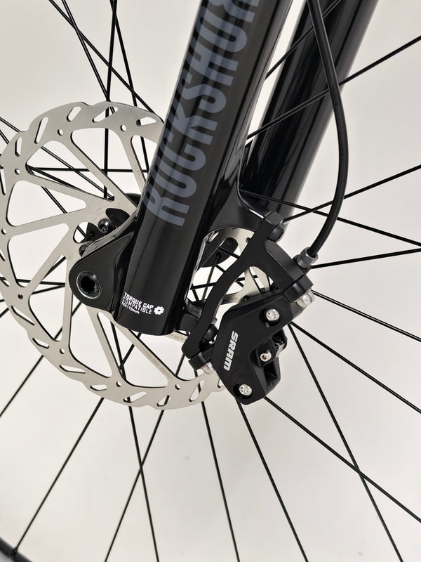 Detailed look at the bike's rear view showcasing the components on the Specialized Chisel 2025 Never Used Bike.