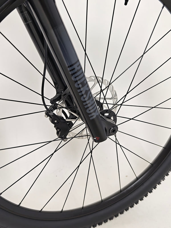 Close-up on the wheel tread of the Specialized Chisel 2025 Never Used Bike, highlighting the performance tires.