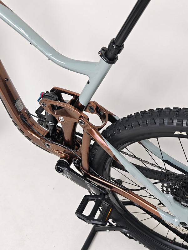 Profile view of Giant Trance X 2 2023 mountain bike, showcasing its overall design and color scheme.
