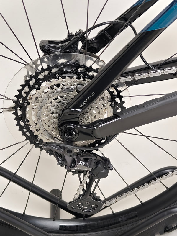 Trek Fuel EX 8 XT 2022 showcasing its best angles outdoors, perfect for mountain biking enthusiasts.