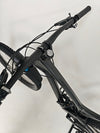 Another angle of the Evil Insurgent LS 27.5 Carbon bike revealing its suspension and tire grip.